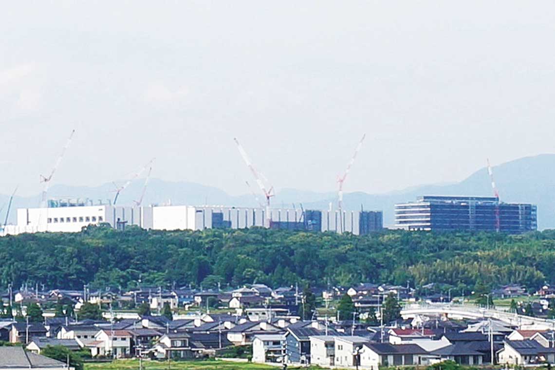 半導体関連企業が集まる工業団地の一角で工事は進む。敷地面積は約21haで福岡ドーム3.3個分。
